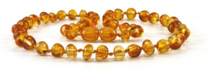 
                
                    Load image into Gallery viewer, Authentic Baltic Amber Baby Teething Necklace Honey color Rounded
                
            