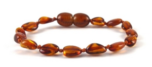 
                
                    Load image into Gallery viewer, Authentic Baltic Amber Baby Teething Bracelet Cognac color Oval Shape Beads
                
            
